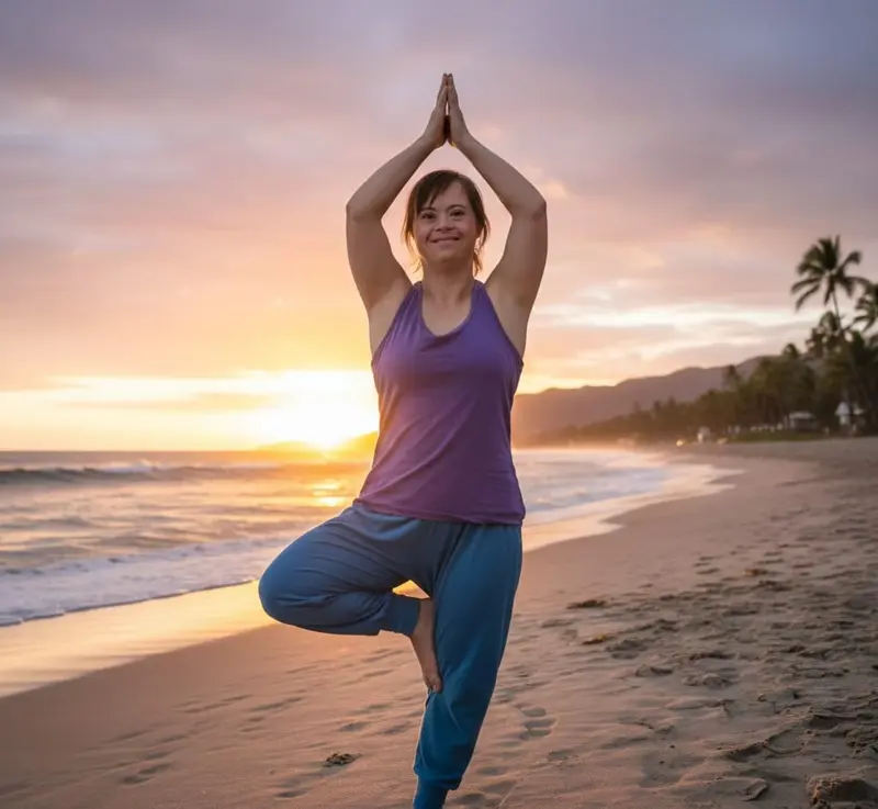 Posizione dell'albero yoga sulla spiaggia al tramonto